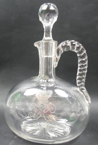 A full size crystal glass wine jug engraved with a crowned 'VR' for Queen Victoria, English circa 1860