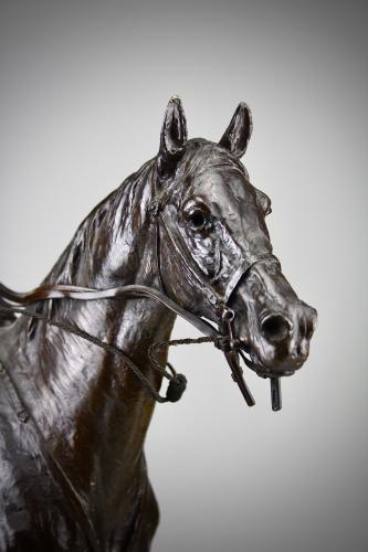 Detail of Sydney March equestrian bronze group. 